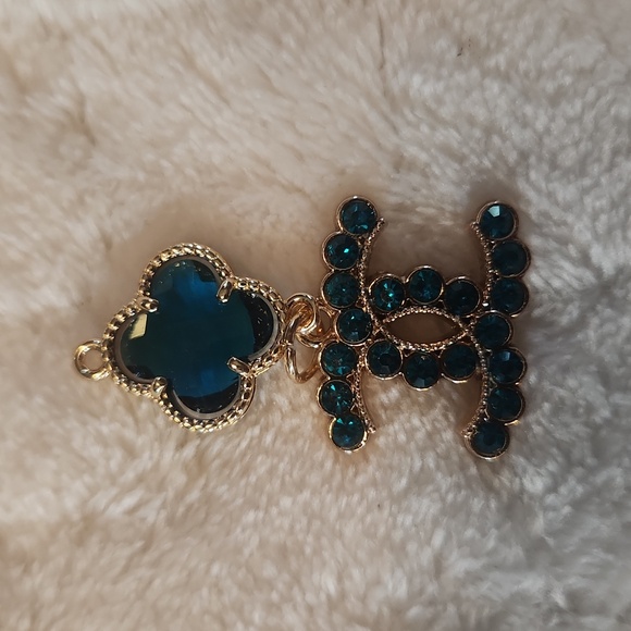 CHANEL Accessories - Chanel stamped pendant